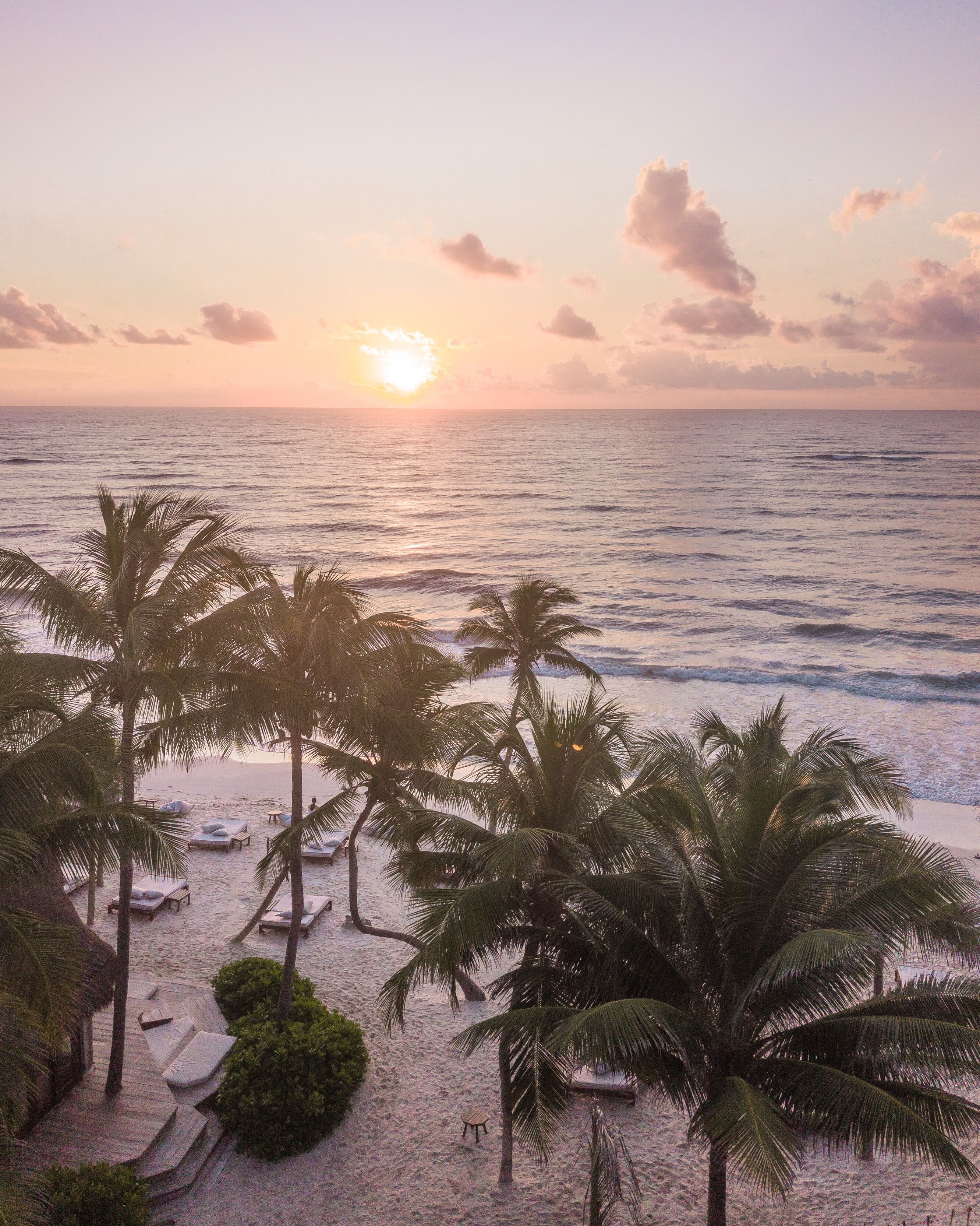On the beach, sun loungers, beach umbrellas, beach towels