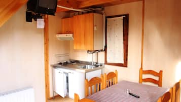 Bungalow, 2 Bedrooms (Duplex) | Living area | TV, fireplace