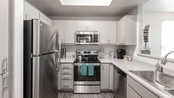 Luxury Condo, 2 Bedrooms, 2 Bathrooms | Private kitchen | Full-size fridge, microwave, oven, stovetop