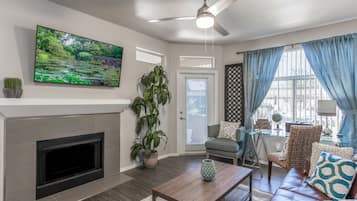 Luxury Condo, 2 Bedrooms, 2 Bathrooms | Living area | 55-inch Smart TV with satellite channels, TV, fireplace