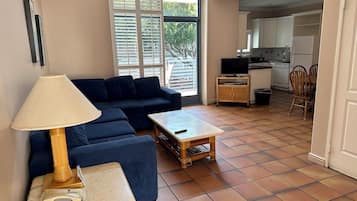 Luxury Quadruple Room, 1 King Bed with Sofa bed, Non Smoking | Living area | Flat-screen TV