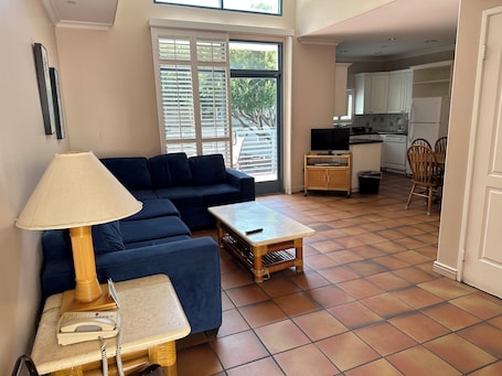 Luxury Quadruple Room, 1 King Bed with Sofa bed, Non Smoking | Living area | Flat-screen TV