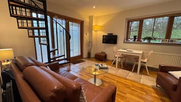 Superior cottage, 1 kingsize bed, niet-roken, aan tuin | Woonruimte