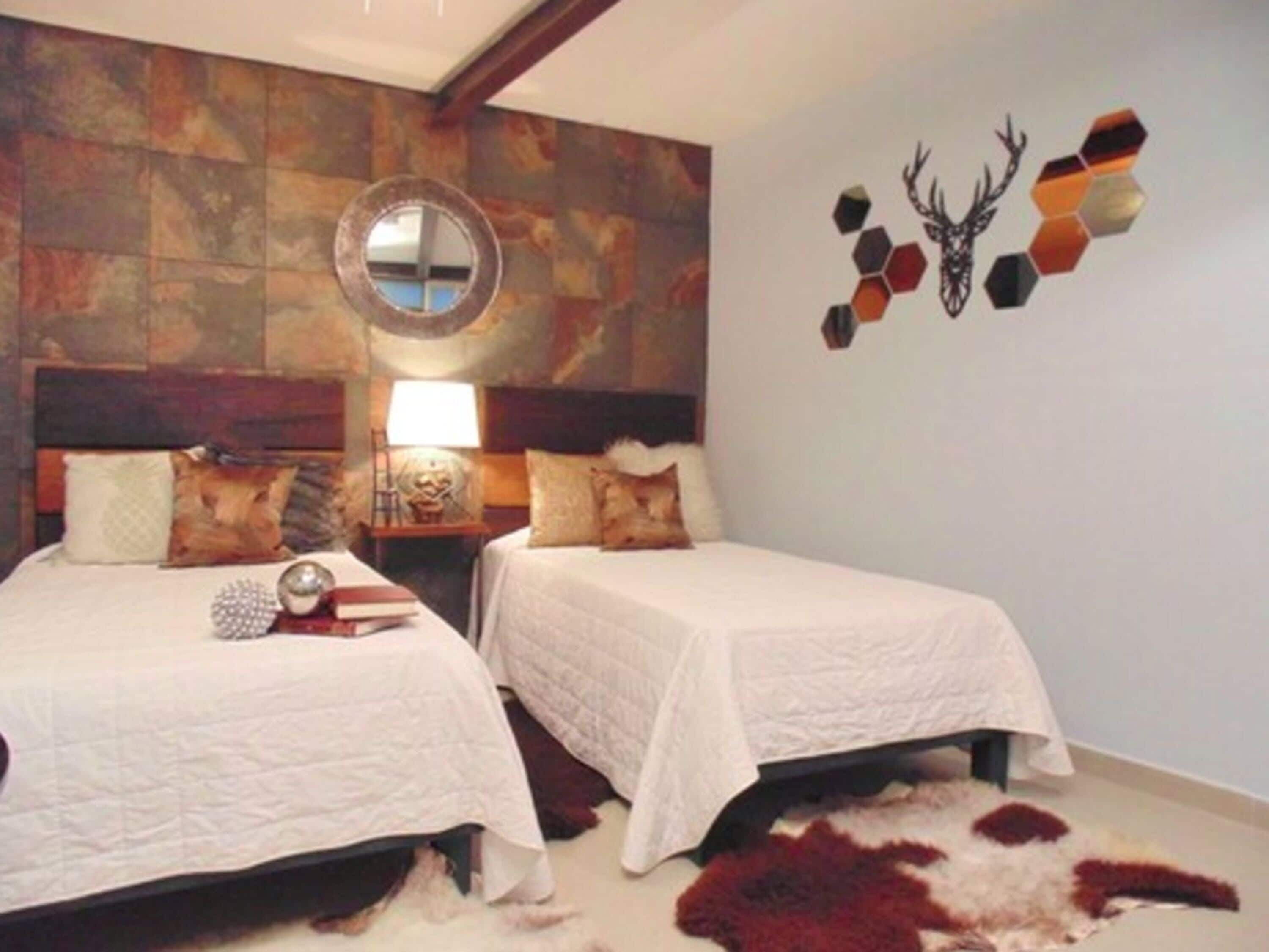Down comforters, iron/ironing board, free WiFi, bed sheets