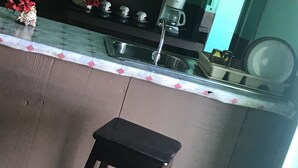 Comfort Double Room, 1 Large Twin Bed, Smoking | Private kitchen | Coffee/tea maker, fridge, cookware/dishes/utensils - Beach Wave Villa (Long Bay)