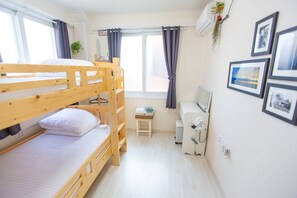 Premium bedding, blackout curtains, soundproofing, free WiFi