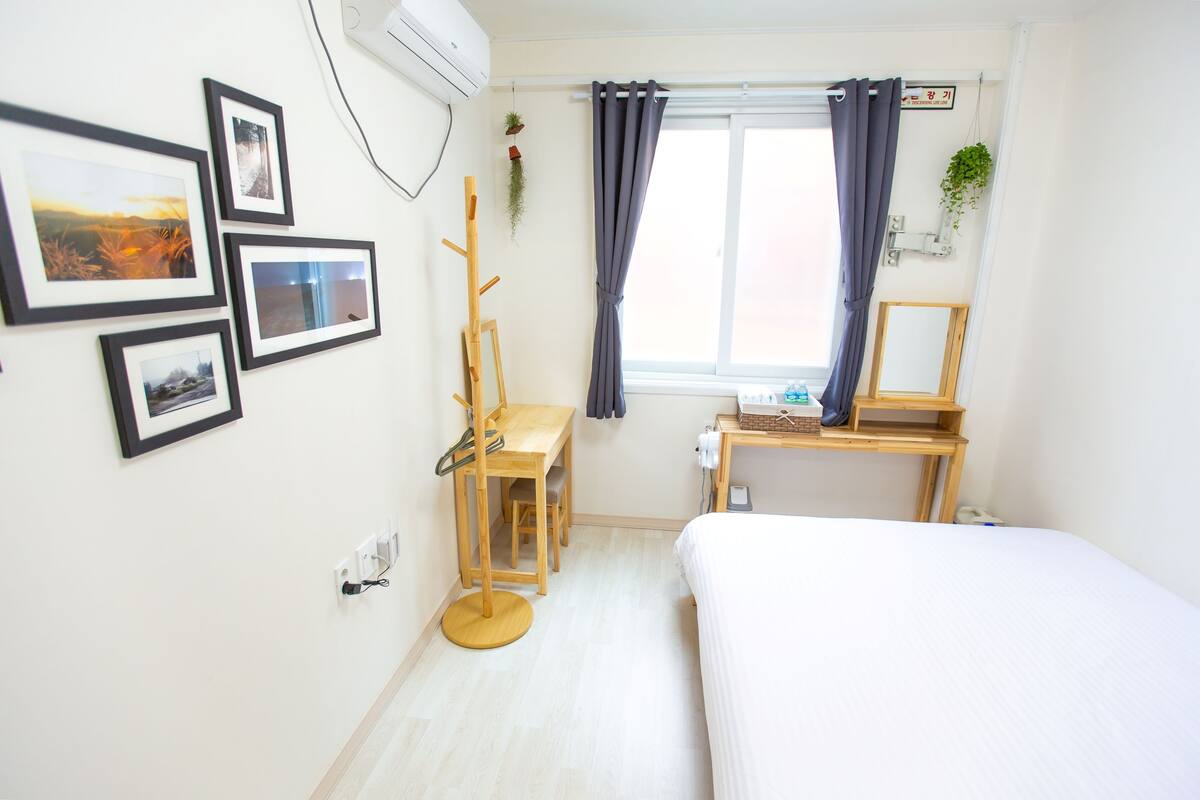 Premium bedding, blackout curtains, soundproofing, free WiFi