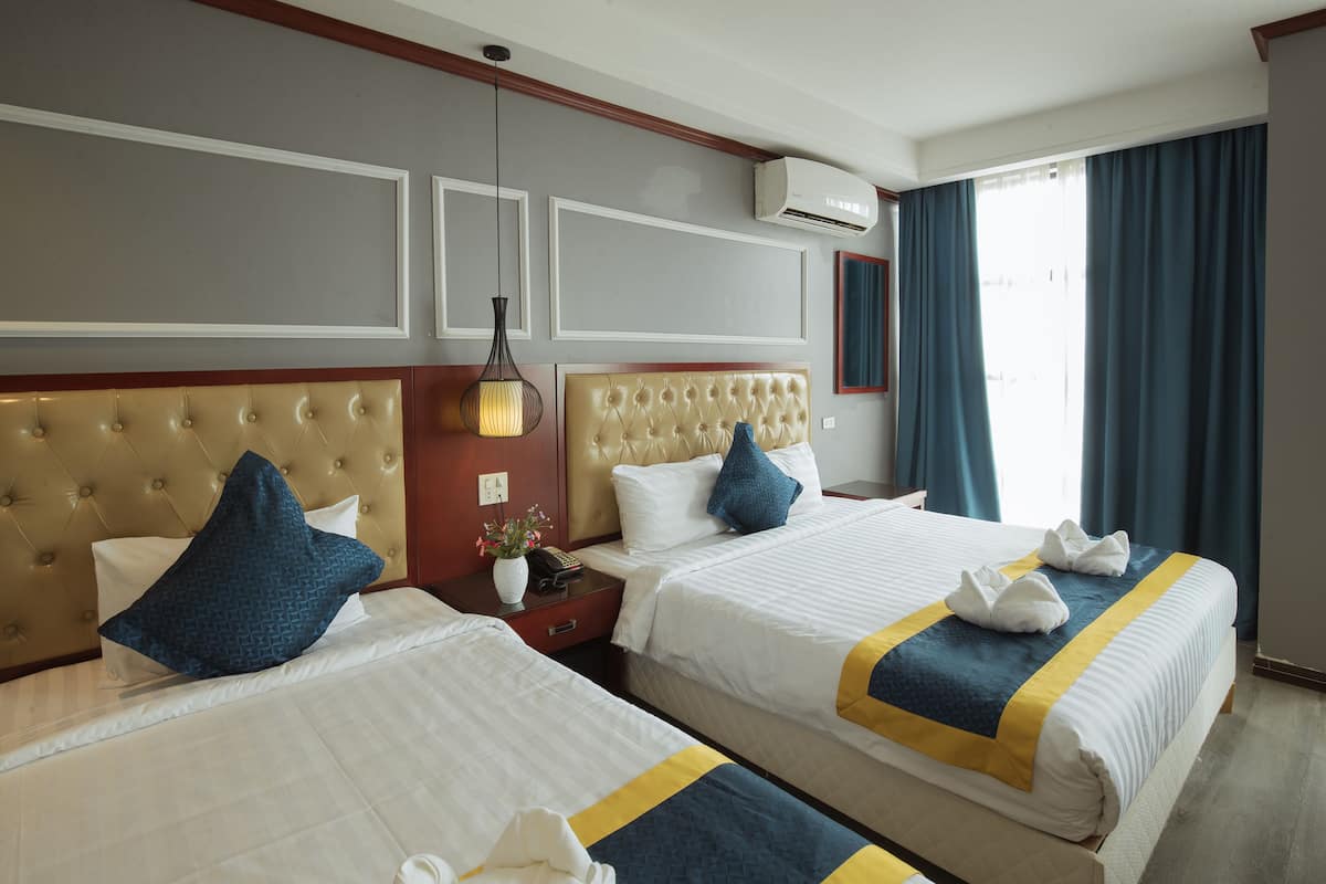 Deluxe Twin kamer | 1 slaapkamer, luxe beddengoed, een minibar, een kluis op de kamer
