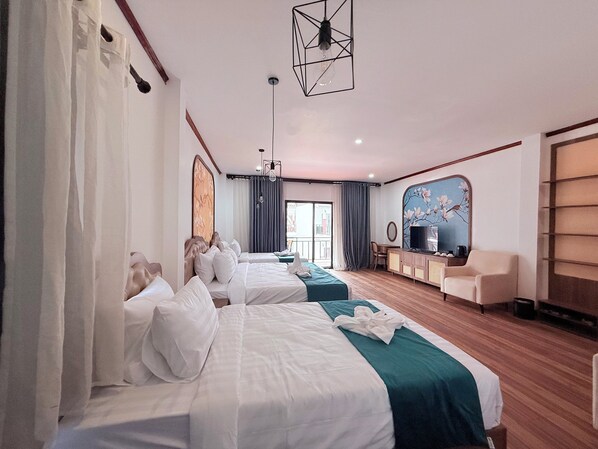 Phòng dành cho gia đình | Bộ đồ giường cao cấp, minibar, két bảo mật tại phòng, bàn