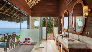 Hanging One Bedroom Pool Villa, Ocean View | Bathroom | Shower, rainfall showerhead, free toiletries, hair dryer