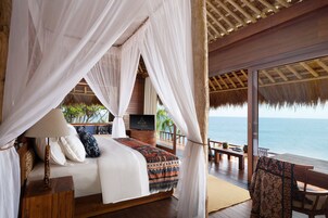 One Bedroom Pool Villa, Ocean View | Free minibar, in-room safe, individually decorated