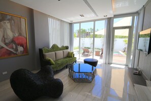 Exclusive House, 3 Bedrooms, Private Pool, Courtyard Area | Living area | 58-inch LED TV with cable channels, TV - Splendi Villa (Hengchun)