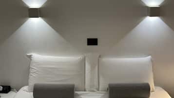 Premium bedding, down comforters, minibar, in-room safe