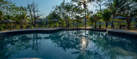 Outdoor pool, pool umbrellas, sun loungers