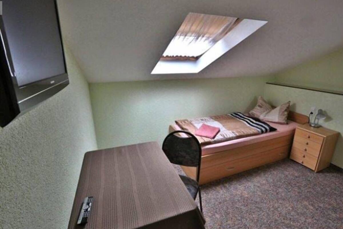 Habitación individual, baño privado (Z5) | Wifi gratis y ropa de cama