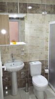 Shower, free toiletries, hair dryer, towels