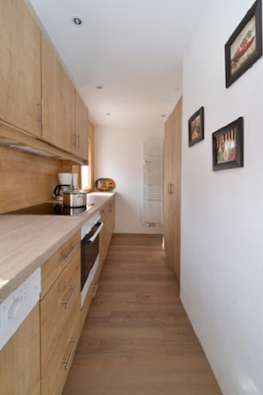 Apartment, 2 Bedrooms | Private kitchen | Fridge, microwave, oven, stovetop