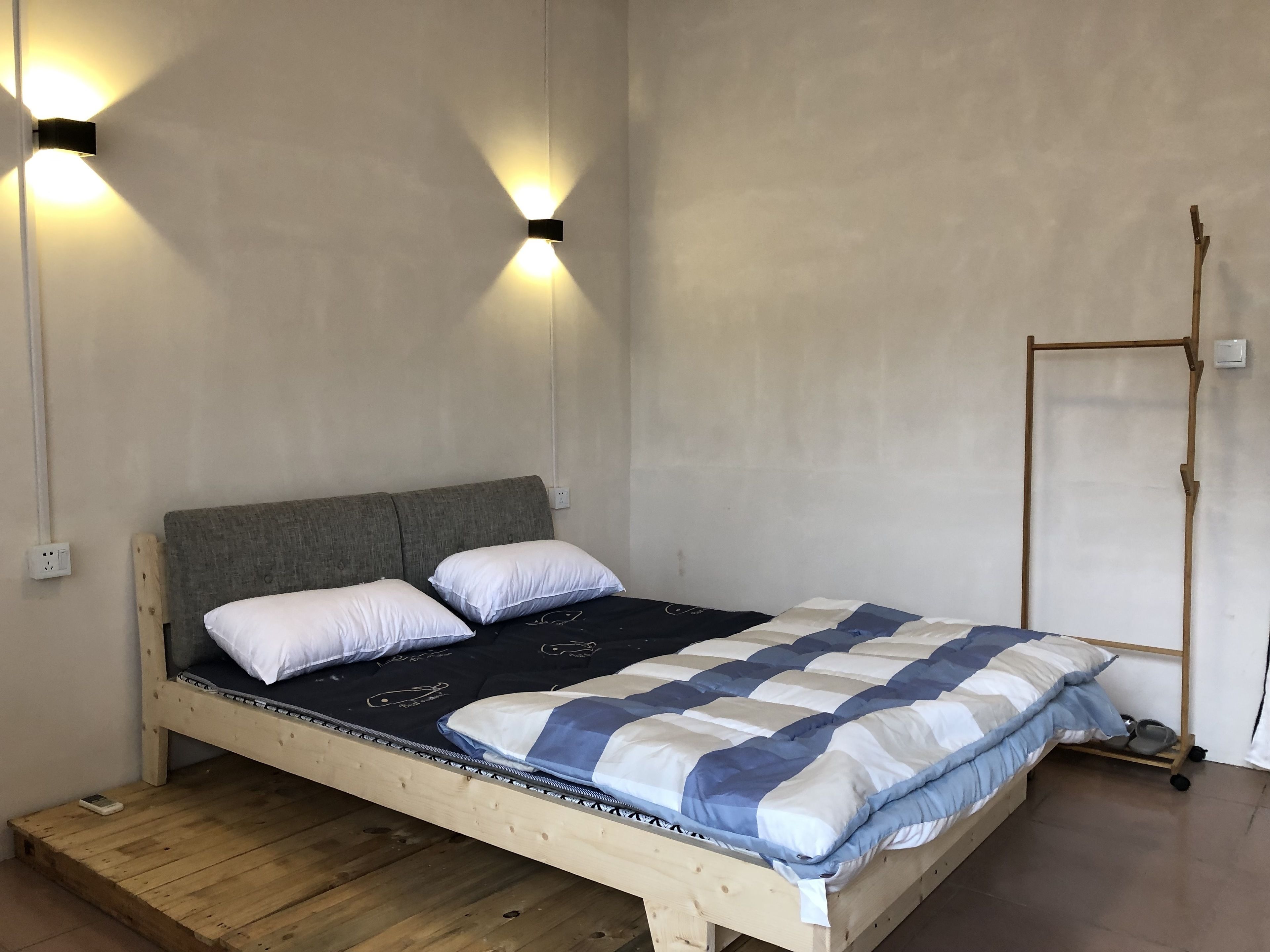 Premium bedding, desk, blackout curtains, soundproofing