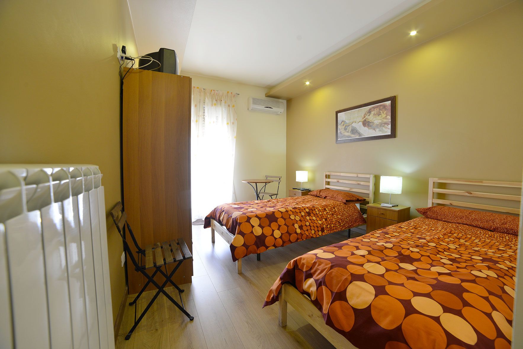 Triple Room, Accessible | Minibar, desk, blackout drapes, soundproofing