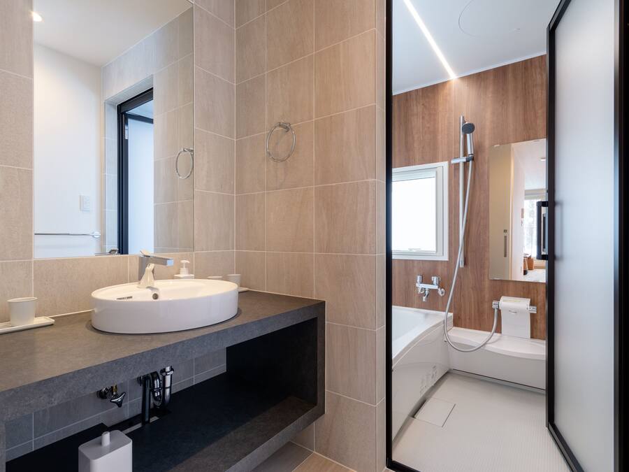Apartment, 2 Bedrooms | Bathroom | Shower, free toiletries, hair dryer, slippers