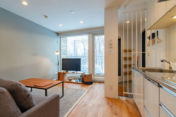 Apartment, 1 Bedroom (for 2 Guests) | Living area | Flat-screen TV, Netflix