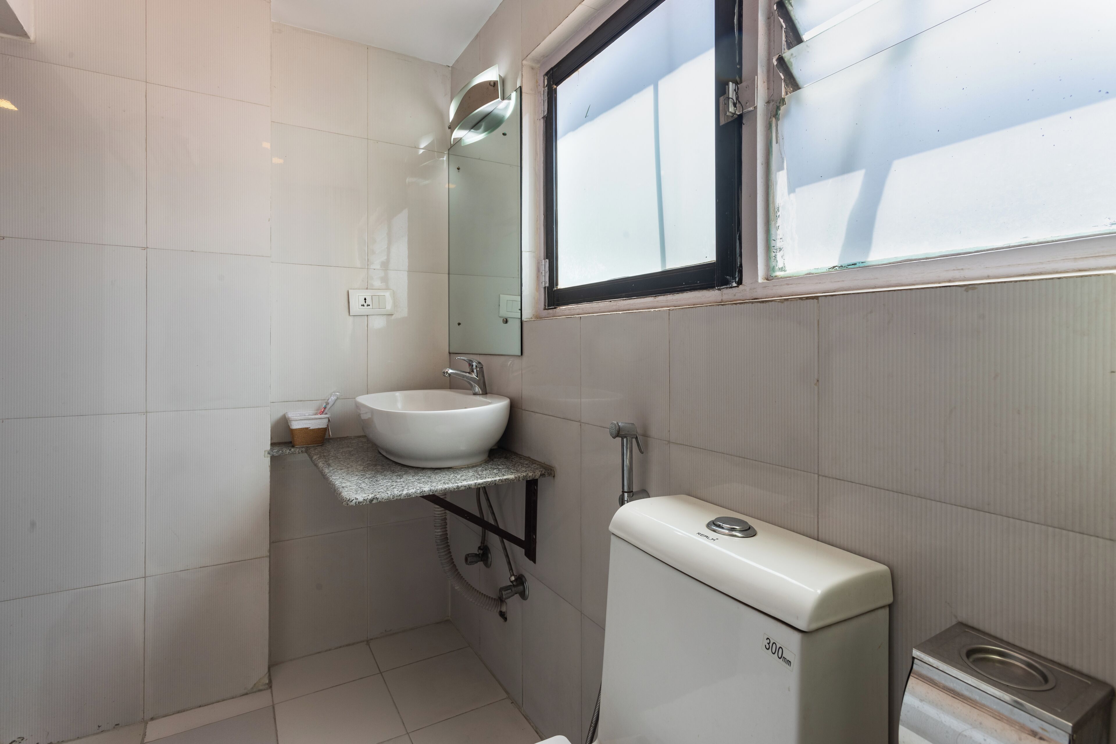 deluxe twin room | bathroom | shower, rainfall showerhead, free toiletries, hair dryer