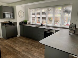 Appartement, privébadkamer | Gemeenschappelijke keuken