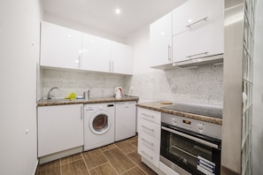 Apartment, Patio, City View | Private kitchen