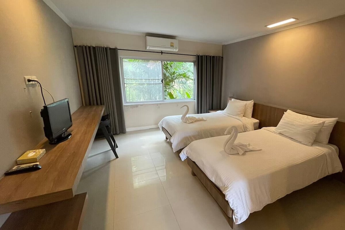 Chambre Standard avec lits jumeaux | Rideaux occultants, Wi-Fi gratuit