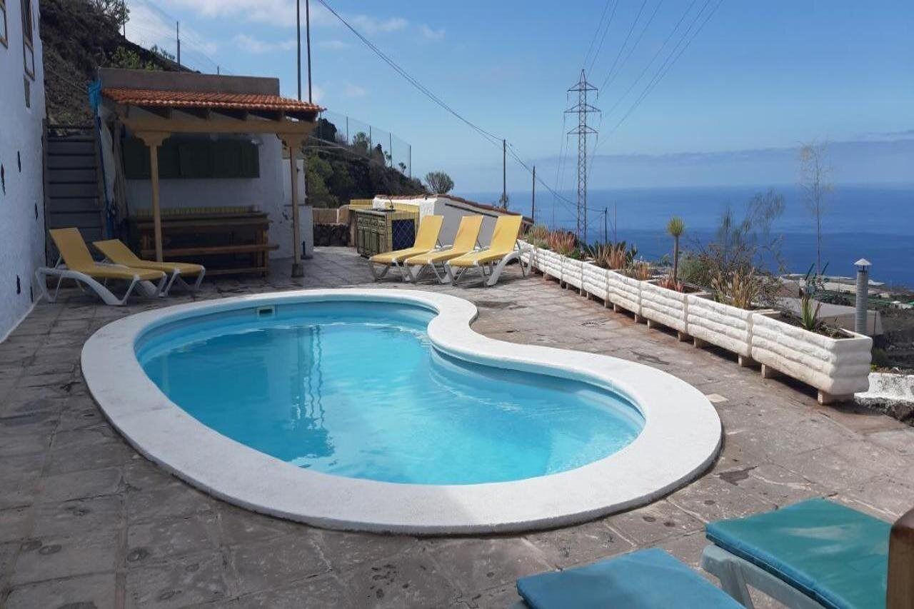 Outdoor pool, pool umbrellas, pool loungers