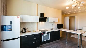 Superior-Apartment | Eigene Küche | Kühlschrank, Mikrowelle, Herdplatte, Wasserkocher