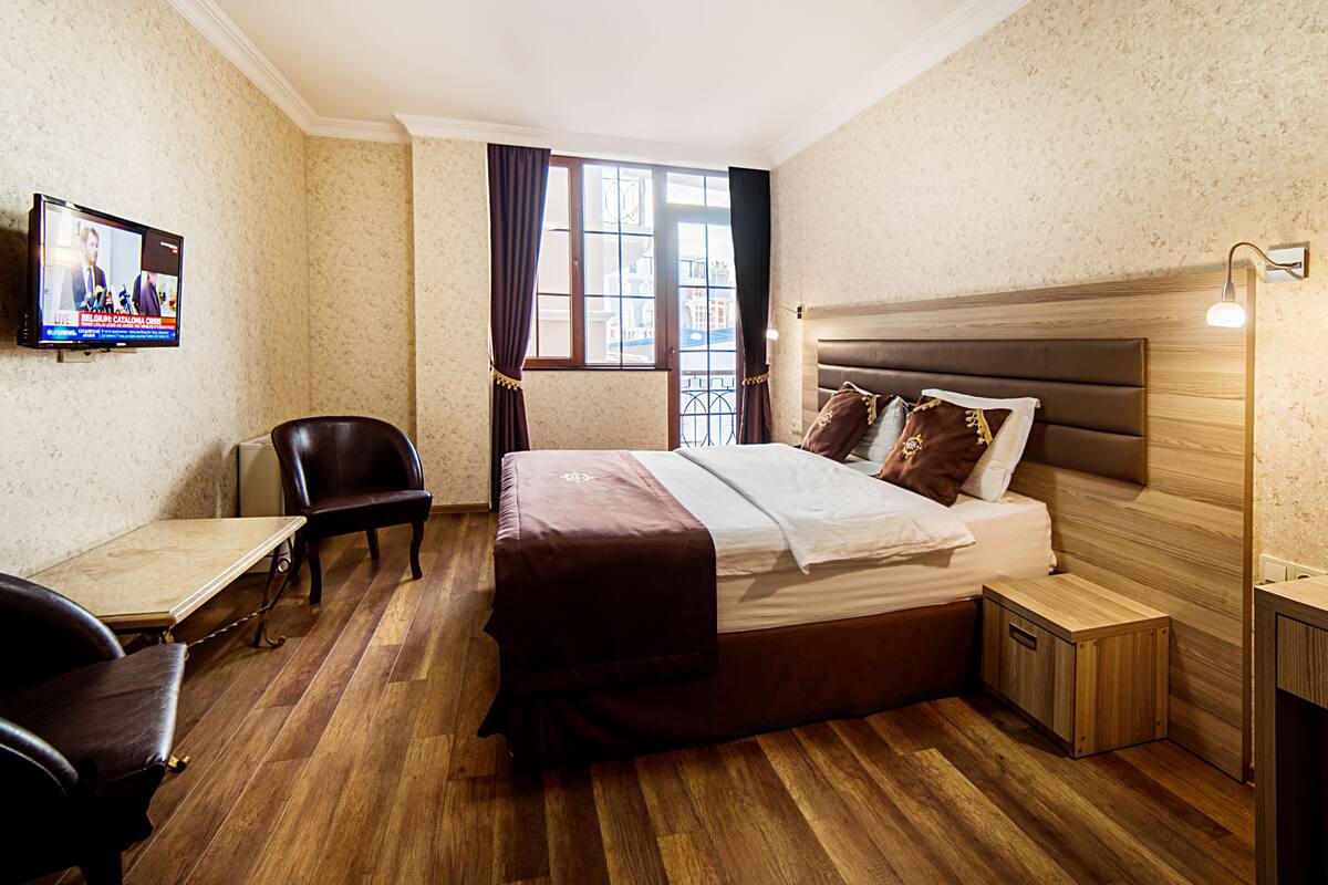 Standard Double Room, Courtyard View (Plus) | Minibar, in-room safe, iron/ironing board (on request)