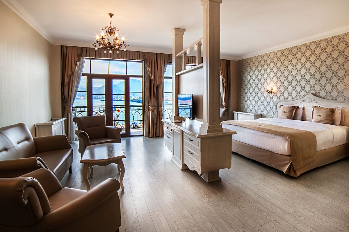 Junior Suite, 1 Bedroom, Sea View | 1 bedroom, minibar, in-room safe, individually decorated