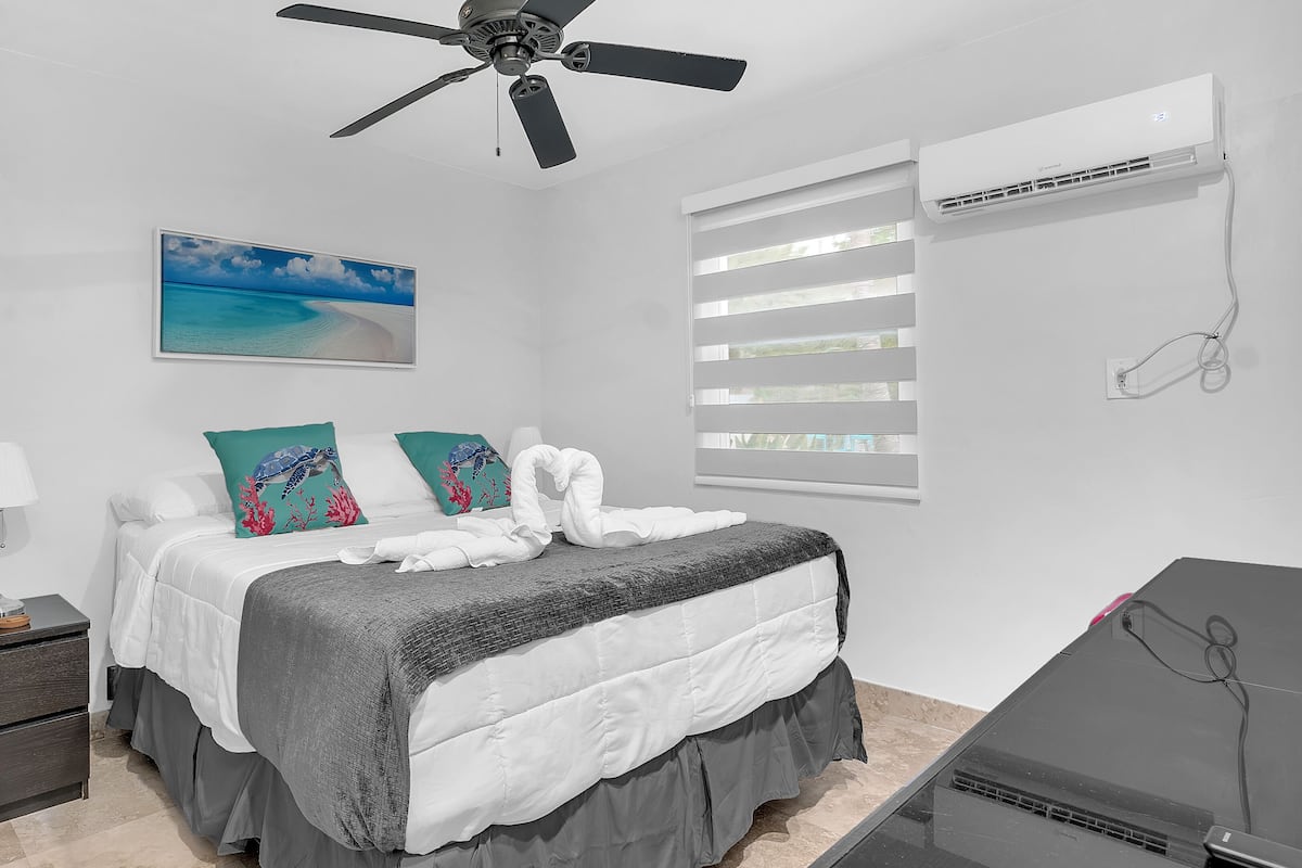 3 - Deluxe Queen One Bedroom Suite w/ Full Couch Bed | Premium bedding, Tempur-Pedic beds, laptop workspace, blackout drapes