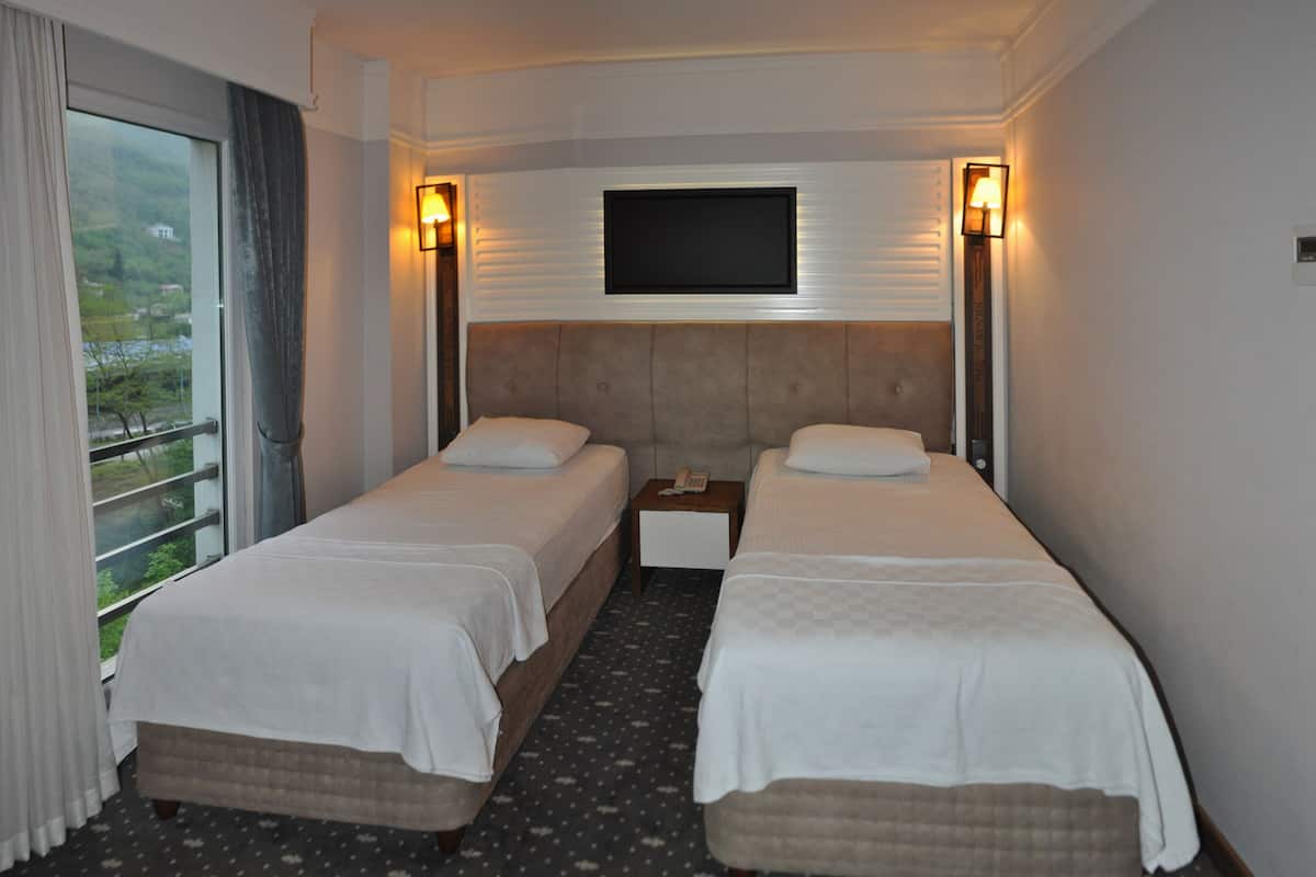 Double or Twin Room | In-room safe, WiFi (free), bed sheets