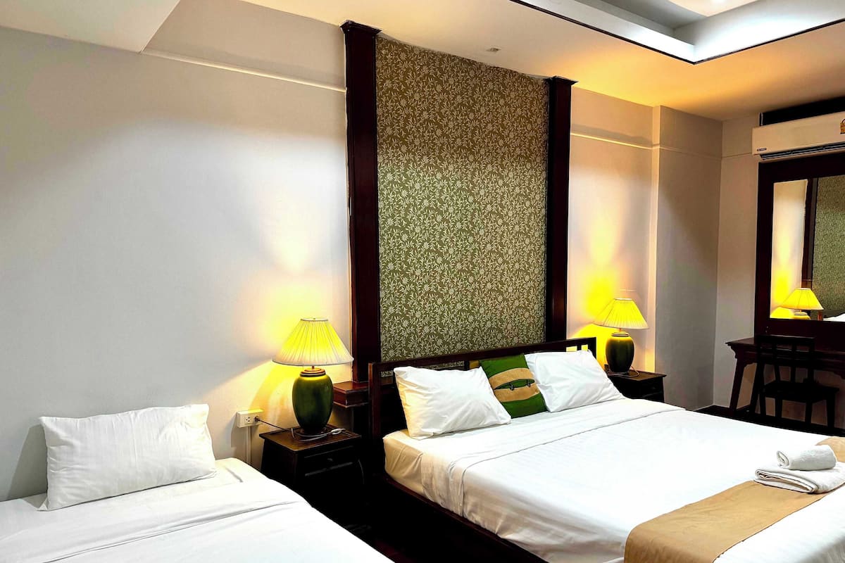 Tremannsrom – deluxe | 1 soverom, minibar, safe på rommet og individuelt dekorert