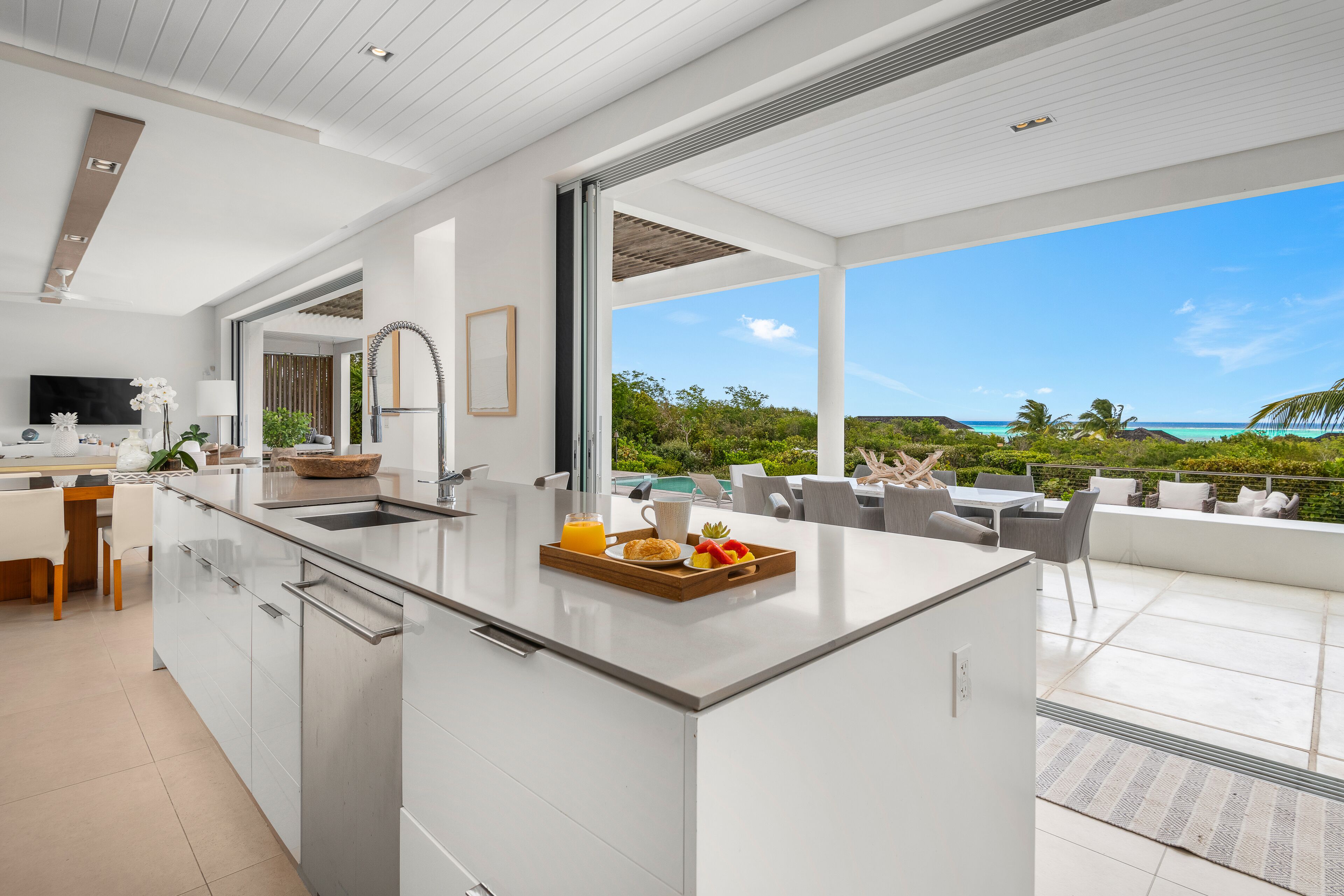 North Shore 5 Bedroom Ocean View Villa | Private kitchen | Mini-fridge, dining tables
