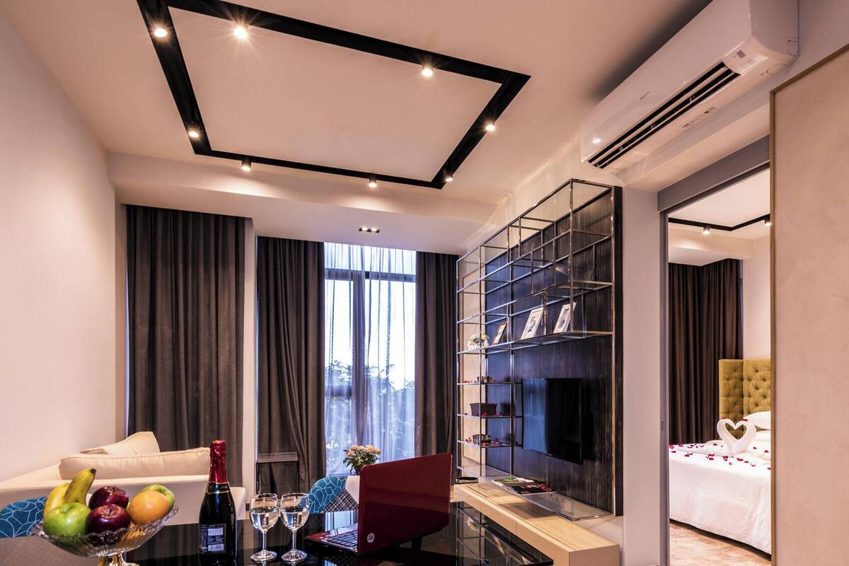 Premium Room | Desk, laptop workspace, blackout drapes, iron/ironing board
