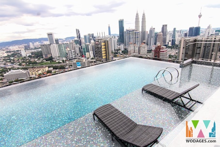 2 outdoor pools, open 8:30 AM to 10 PM, sun loungers