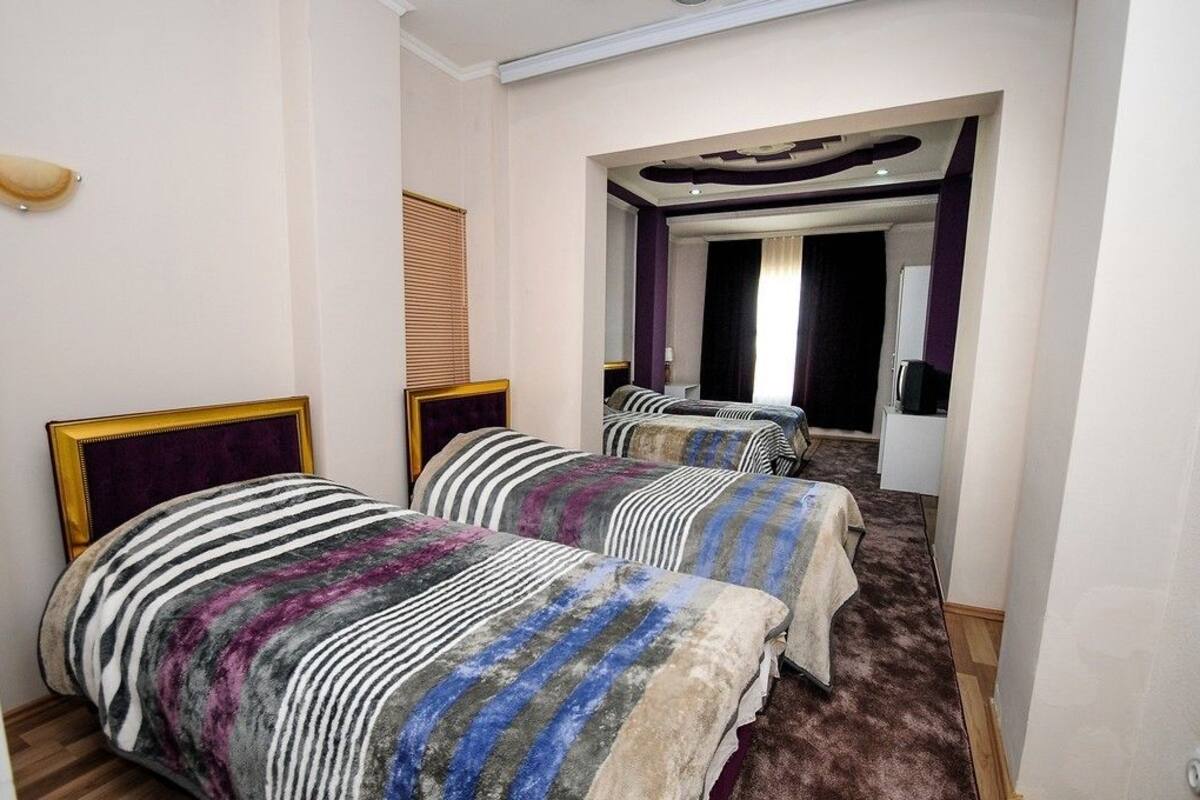 Quadruple Room | Desk, iron/ironing board, free WiFi, bed sheets