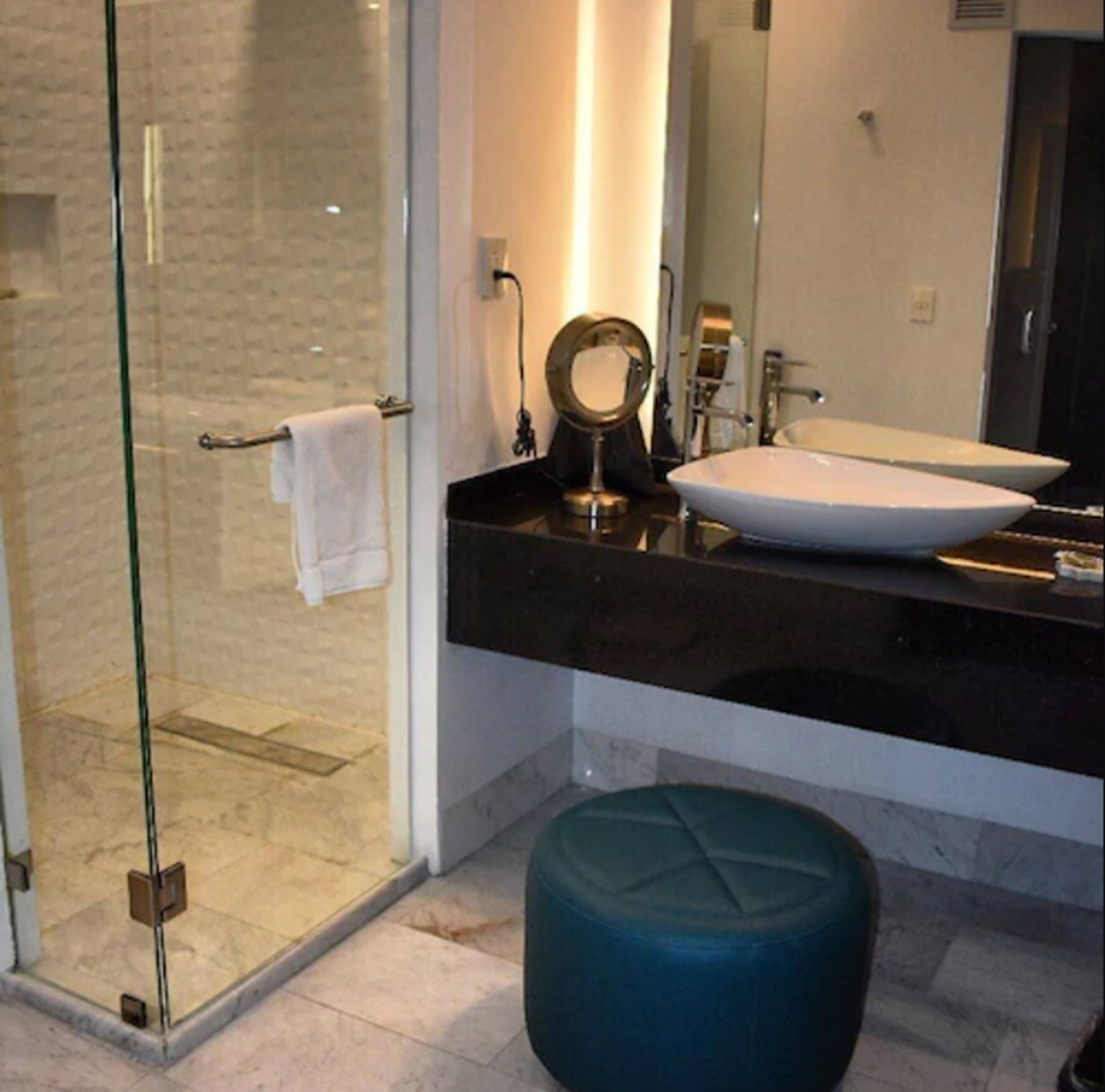 shower, rainfall showerhead, designer toiletries, hair dryer