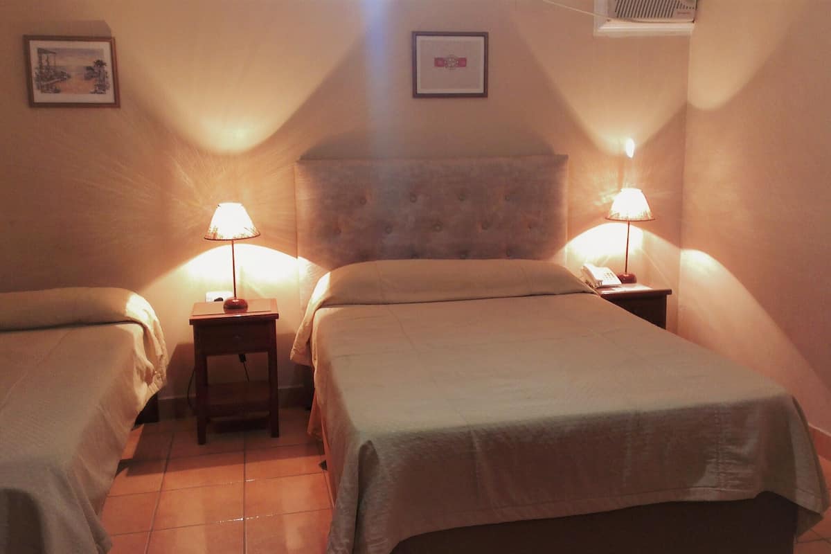Standard Quadruple Room, Multiple Beds, Non Smoking | Desk, iron/ironing board (on request), WiFi (free), bed sheets