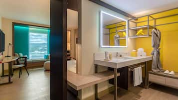 Shower, designer toiletries, hair dryer, bathrobes