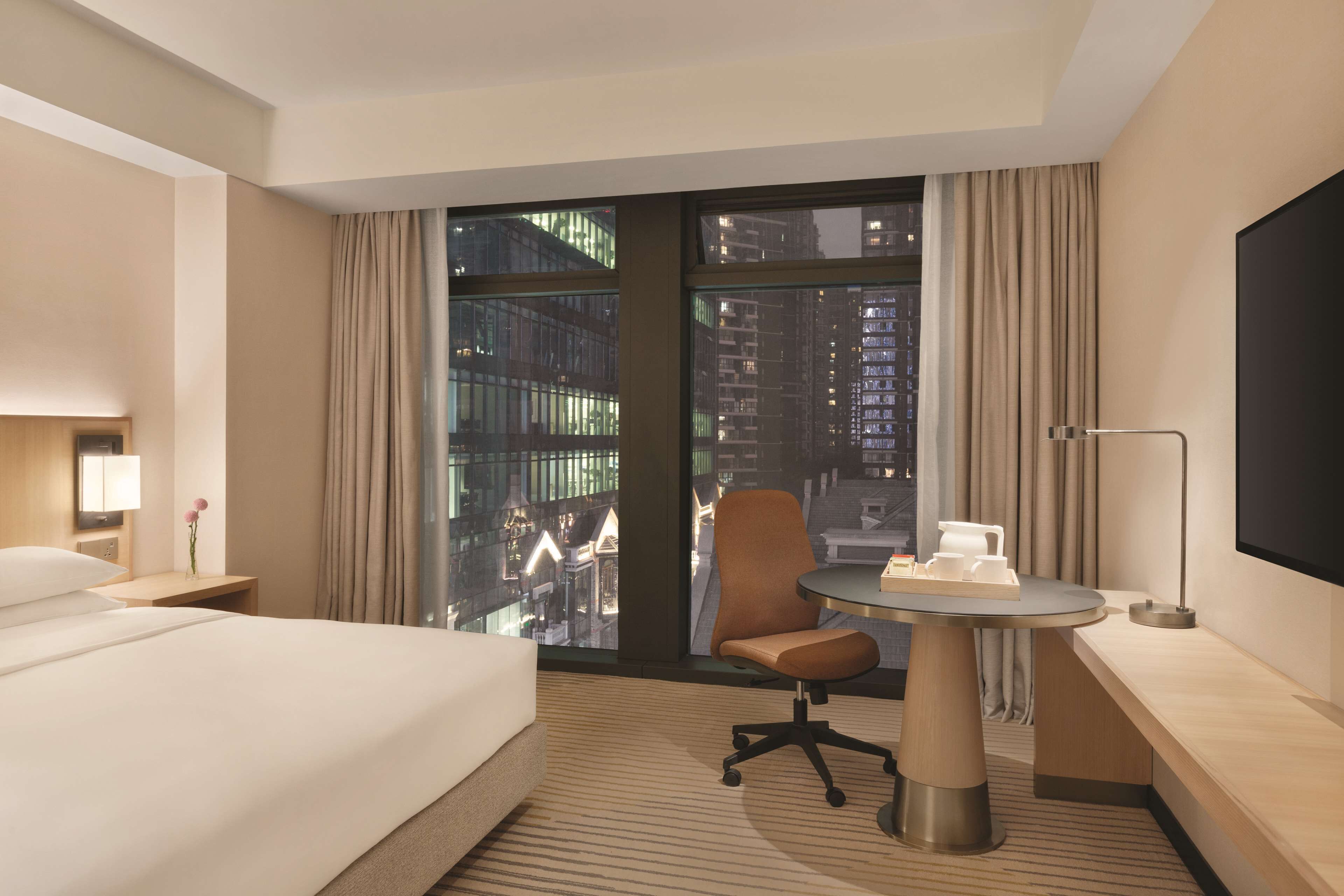 king bed-with sofa bed | premium bedding, down duvets, minibar, in-room safe