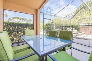 Outdoor dining - Oak Island Cove Homes by Atlas VH (Kissimmee)