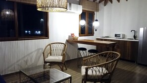 Loft | Living area | 32-inch flat-screen TV with cable channels, TV