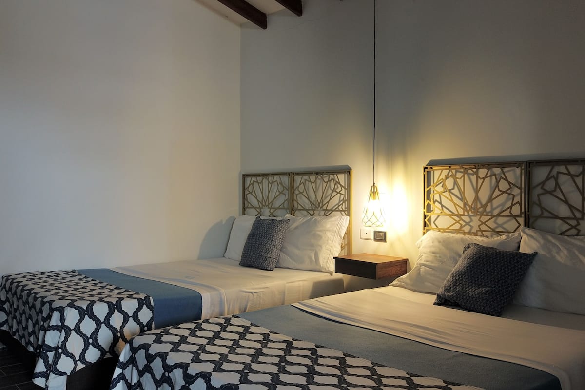 Studio, Multiple Beds | 1 bedroom, desk, laptop workspace, iron/ironing board