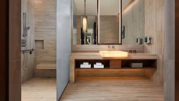 Deluxe Room, 1 King Bed | Bathroom | Separate tub and shower, free toiletries, hair dryer, bathrobes