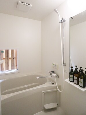 Private Vacation Home | Bathroom | Combined shower/tub, deep soaking tub, designer toiletries, hair dryer