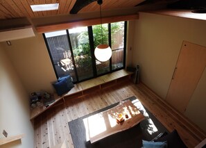 Private Vacation Home | Living room | Flat-screen TV, iPod dock - Kyomachiya Guesthouse Ryoan-Ori (Kyoto)